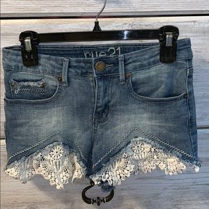 Blue-jean shorts with lace.